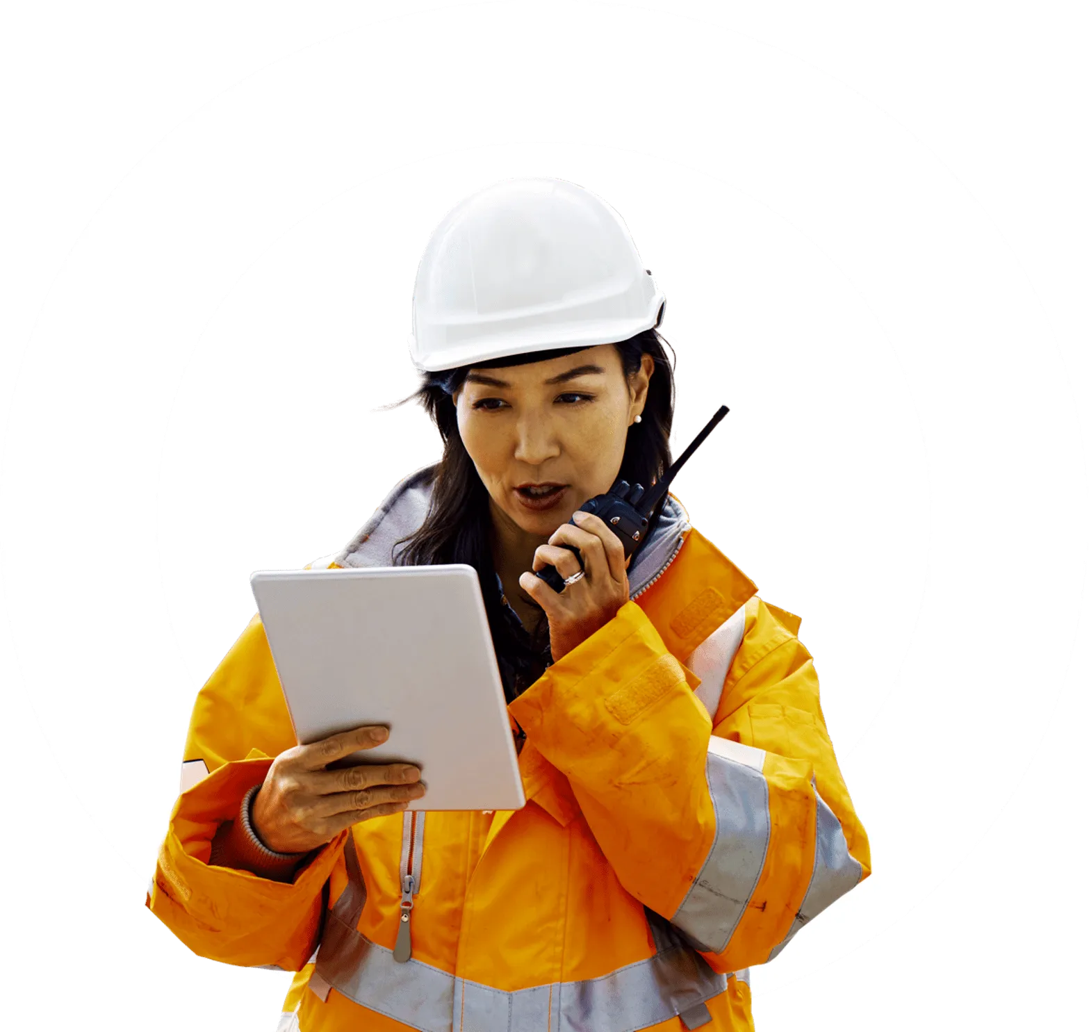 O amplifier woman in hi-vis and hard hat reading documents and using walkie talkie